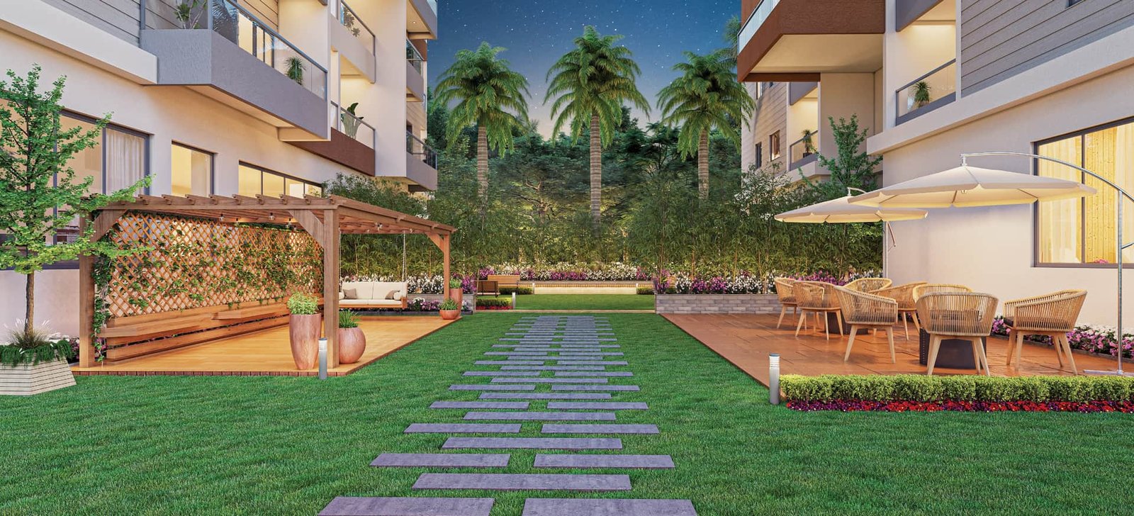 Timber gazebo and umbrella seating beside a stepping-stone garden path at Lal Chand Eco Heights