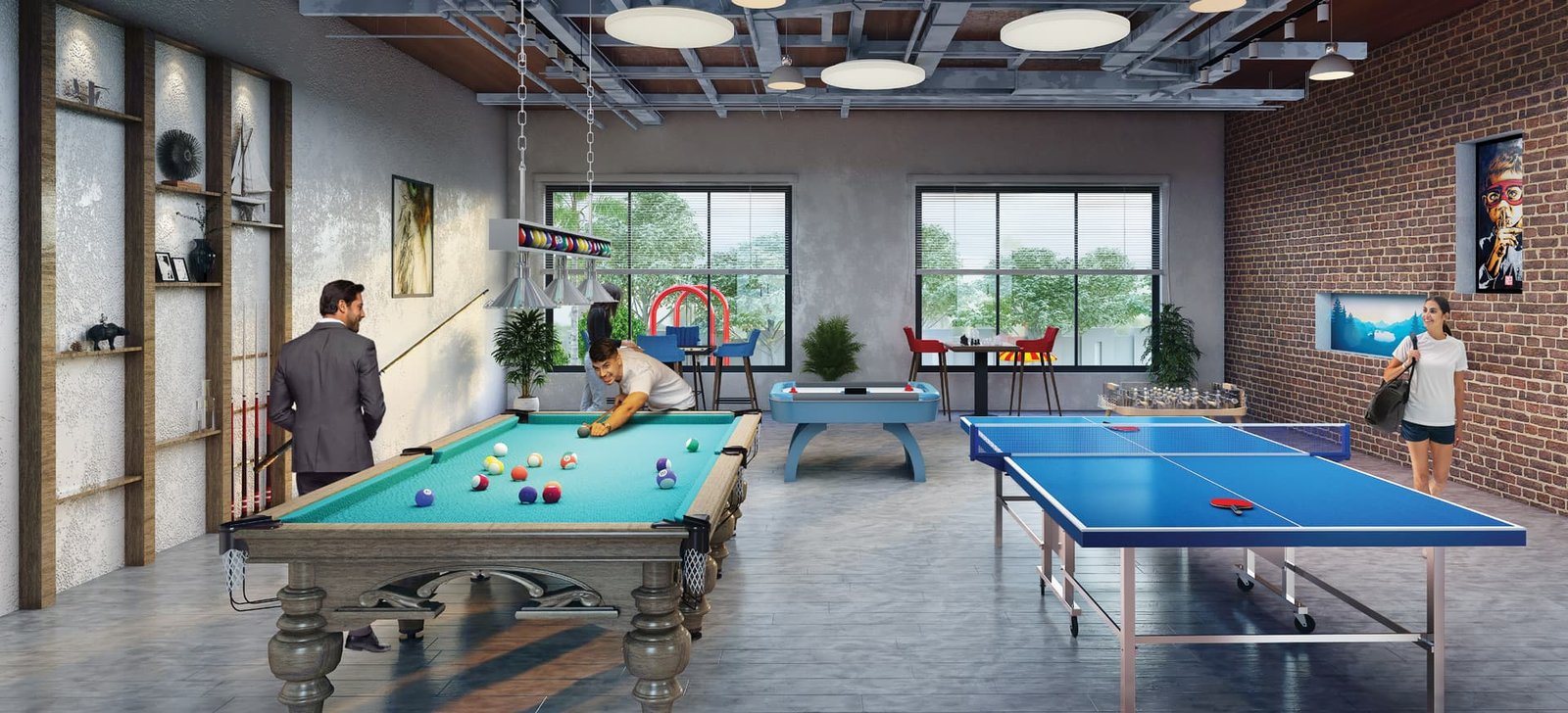 Indoor games room with a billiards table, air hockey and table tennis at Lal Chand Eco Heights