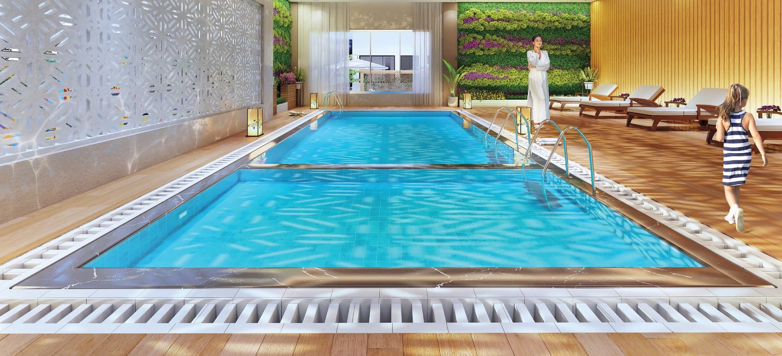 Under-roof swimming pool with timber deck and loungers at Lal Chand Eco Heights