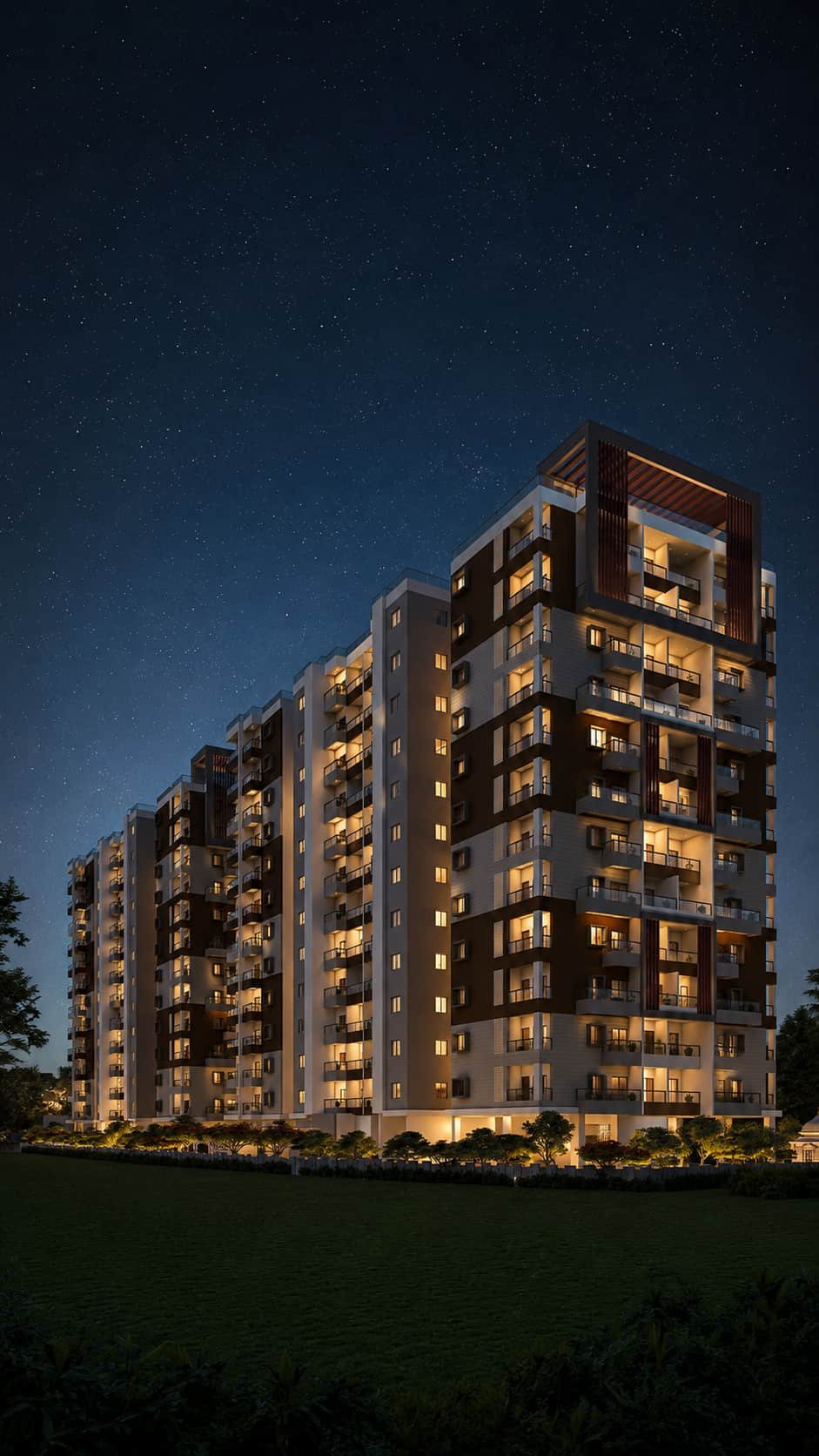 Close view of a Lal Chand Eco Heights tower with warmly lit balconies under a starry sky