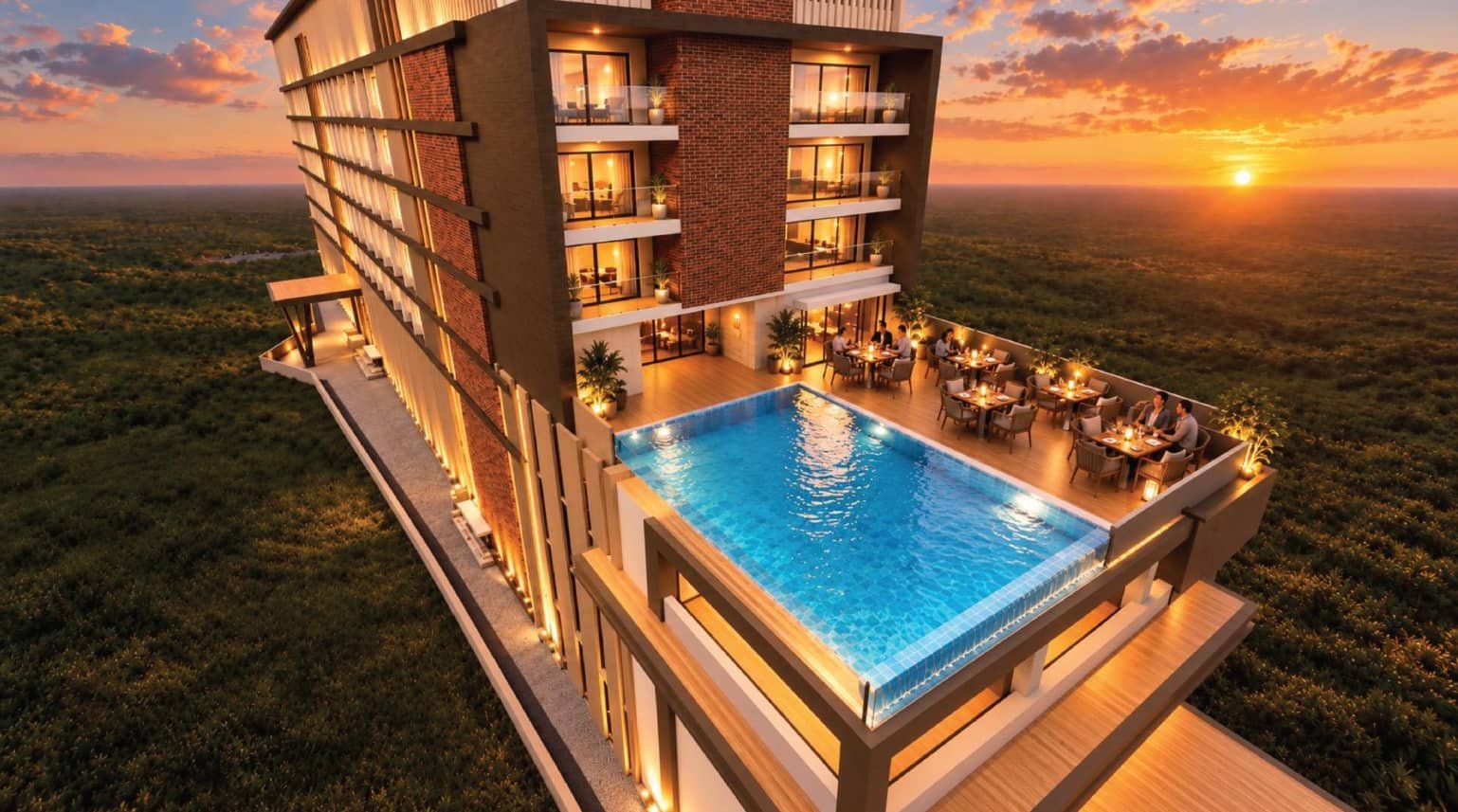 Elevated terrace pool deck with dining seating at The Mall of Hazaribagh, overlooking green surroundings at sunset